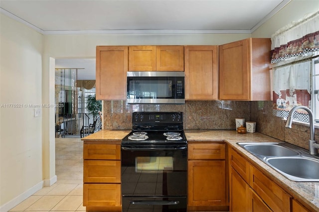 kitchen featuring a sink, black range with electric stovetop, stainless steel microwave, decorative backsplash, and ornamental molding