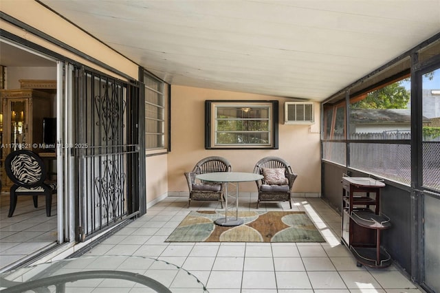 sunroom / solarium with an AC wall unit