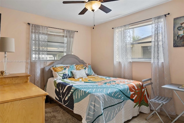 bedroom featuring ceiling fan