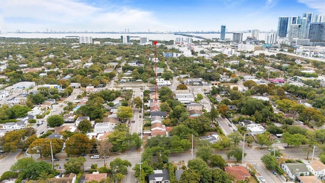 aerial view featuring a water view and a city view