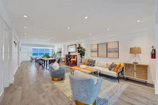 1801 S Surf Rd Unit 2A, Hollywood, FL 33019 - living area with light wood-type flooring, baseboards, and recessed lighting