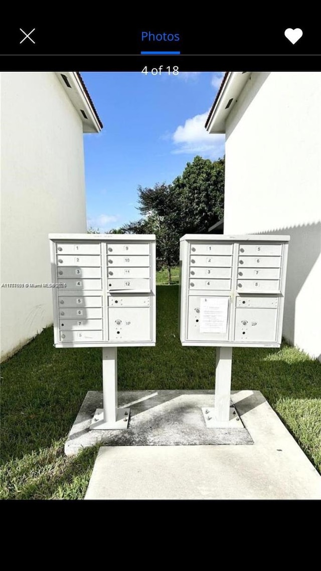 view of home's community with mail area