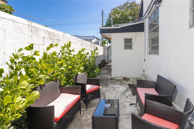 view of patio / terrace featuring outdoor lounge area and a fenced backyard