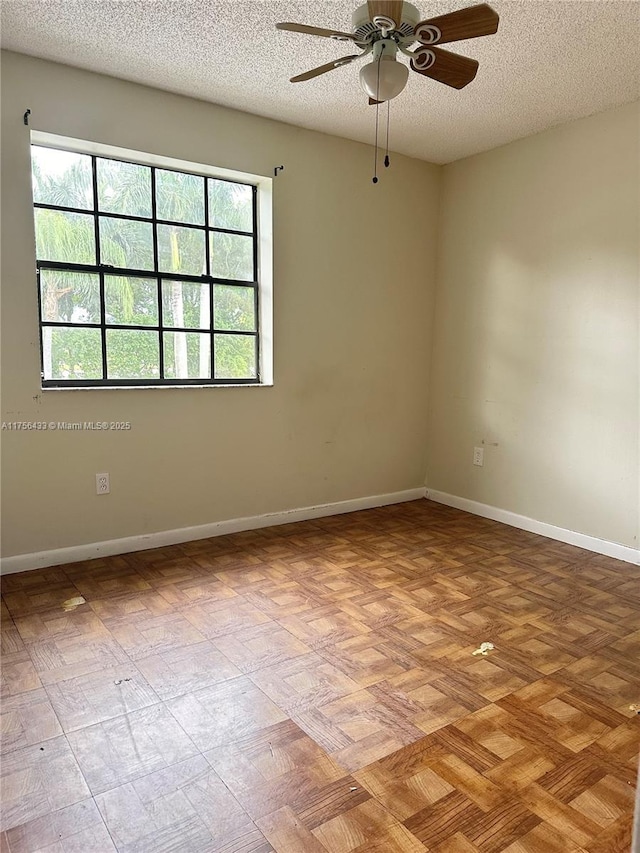 900 Constitution Dr Unit 900L, Homestead, FL 33034 - unfurnished room featuring plenty of natural light, a ceiling fan, and a textured ceiling