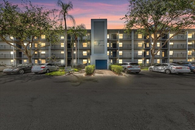 650 SW 124th Ter Unit 105P, Pembroke Pines, FL 33027 - view of apartment building / complex featuring uncovered parking