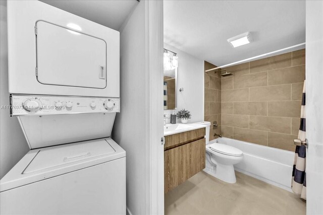 650 SW 124th Ter Unit 105P, Pembroke Pines, FL 33027 - bathroom featuring stacked washer / drying machine, shower / bathtub combination, toilet, and vanity