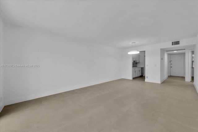 650 SW 124th Ter Unit 105P, Pembroke Pines, FL 33027 - unfurnished living room with baseboards