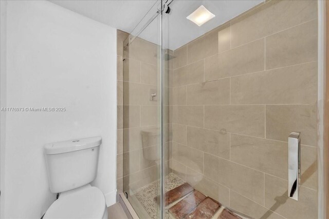 650 SW 124th Ter Unit 105P, Pembroke Pines, FL 33027 - full bathroom featuring a shower stall and toilet