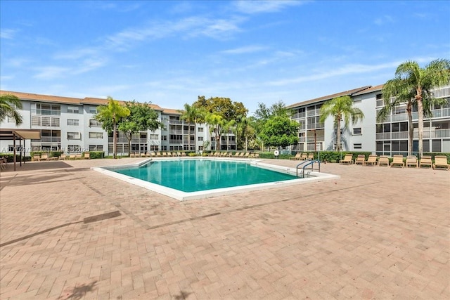 650 SW 124th Ter Unit 105P, Pembroke Pines, FL 33027 - community pool with a patio