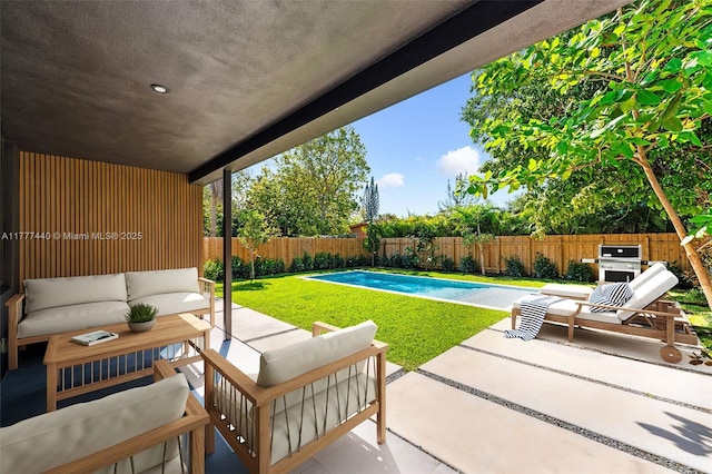 view of patio with a fenced backyard and an outdoor living space