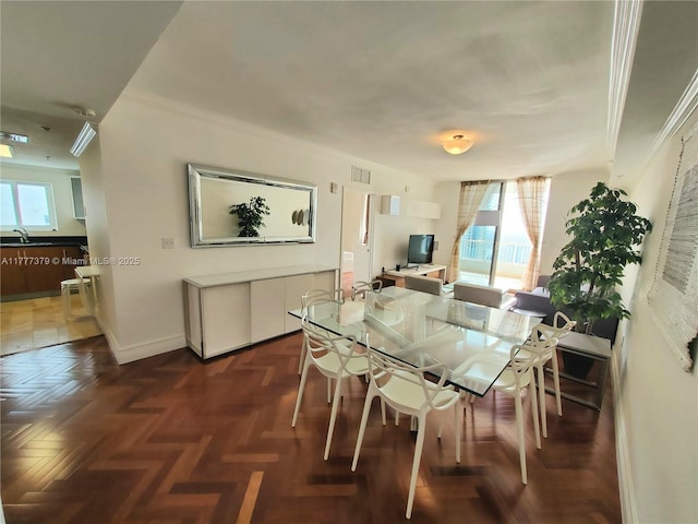 170 SE 14th St Unit 2705, Miami, FL 33131 - dining room with ornamental molding and baseboards