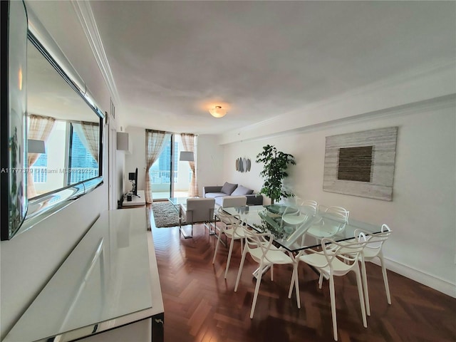 170 SE 14th St Unit 2705, Miami, FL 33131 - dining space featuring ornamental molding and baseboards