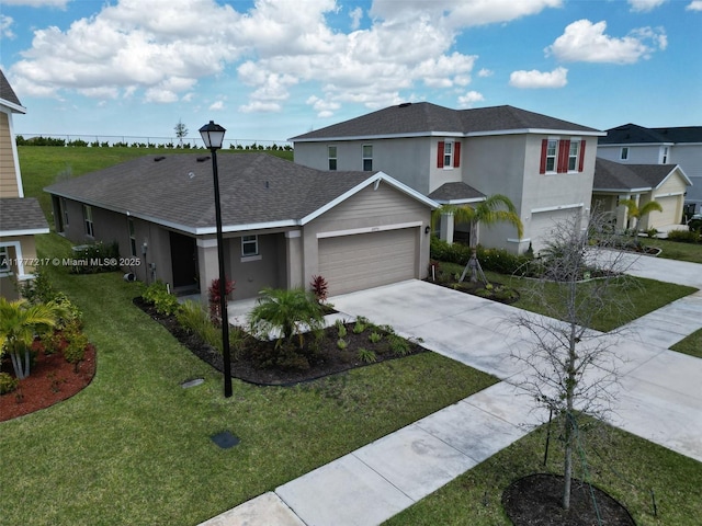 view of front facade with stucco siding, driveway, a shingled roof, and a front yard