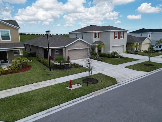view of front of house featuring driveway, a front yard, stucco siding, a residential view, and a shingled roof