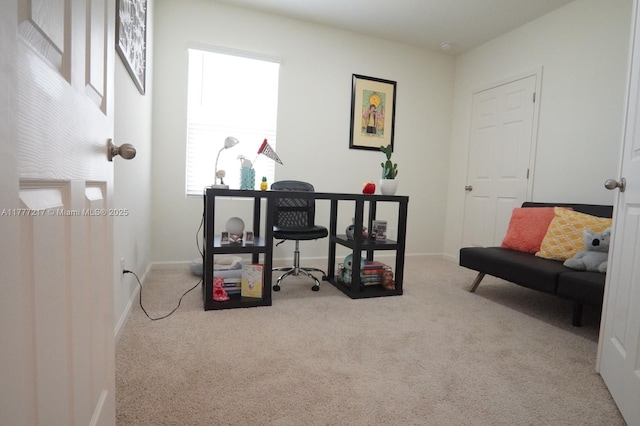 office area with baseboards and carpet floors