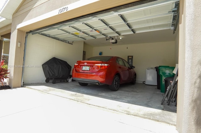 garage featuring a garage door opener