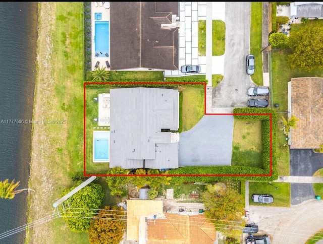 drone / aerial view featuring a water view