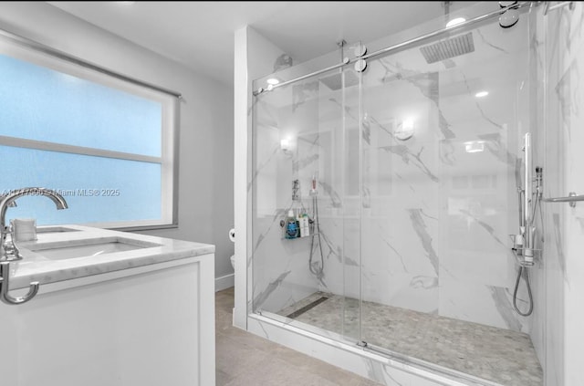 full bathroom with toilet, vanity, and a marble finish shower