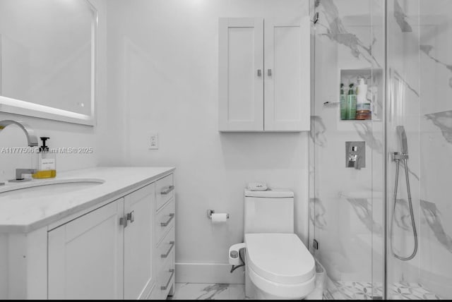full bathroom with baseboards, toilet, vanity, a marble finish shower, and marble finish floor