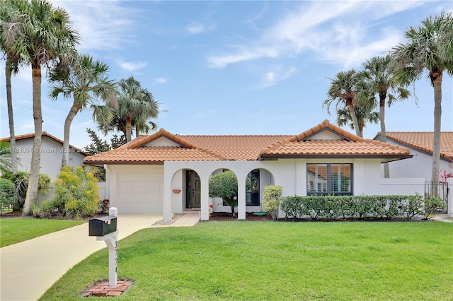 3774 SW Pheasant Run, Palm City, FL 34990 - mediterranean / spanish-style home with concrete driveway, a tile roof, stucco siding, and a garage