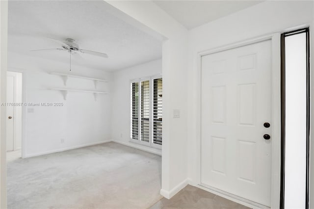 3774 SW Pheasant Run, Palm City, FL 34990 - foyer featuring a ceiling fan, baseboards, and light colored carpet