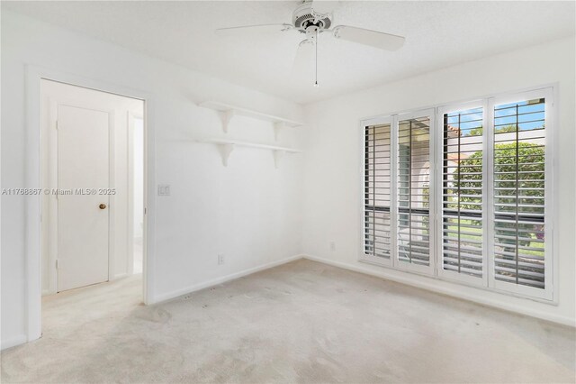 3774 SW Pheasant Run, Palm City, FL 34990 - carpeted spare room featuring baseboards and a ceiling fan