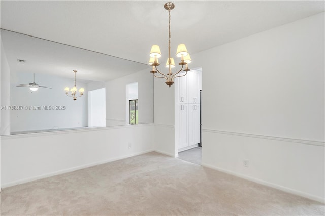 3774 SW Pheasant Run, Palm City, FL 34990 - unfurnished room featuring a chandelier, light colored carpet, and baseboards