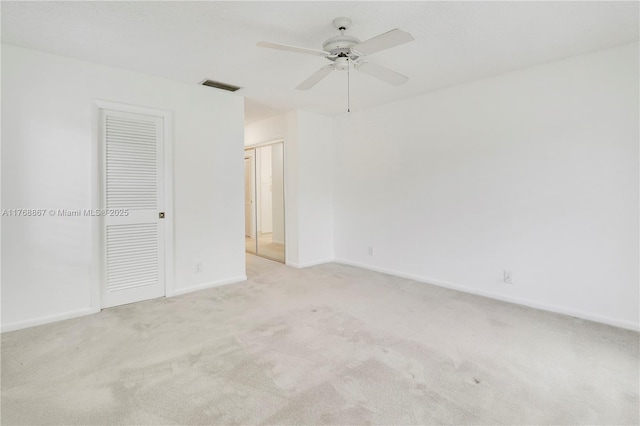 3774 SW Pheasant Run, Palm City, FL 34990 - unfurnished bedroom with carpet flooring, baseboards, and ceiling fan