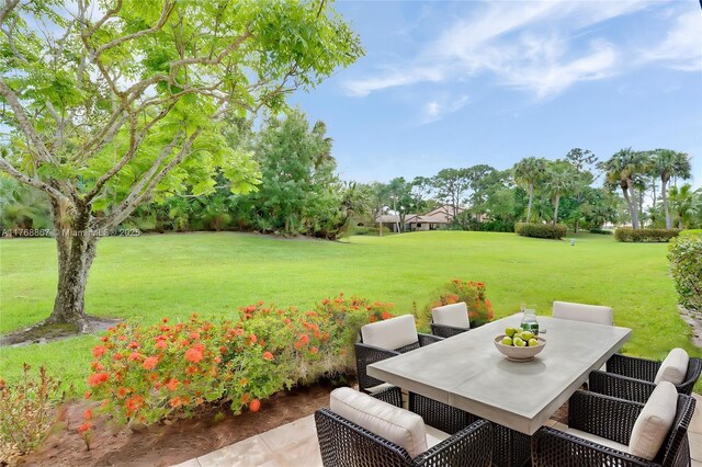 3774 SW Pheasant Run, Palm City, FL 34990 - view of patio / terrace featuring outdoor dining space