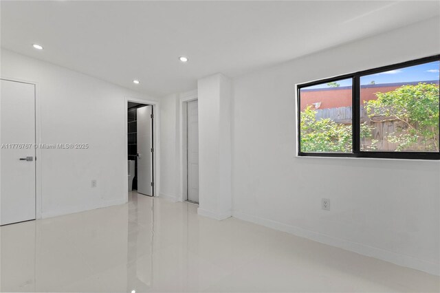 1640 NE 183rd St, North Miami Beach, FL 33179 - unfurnished bedroom with recessed lighting, baseboards, and tile patterned floors