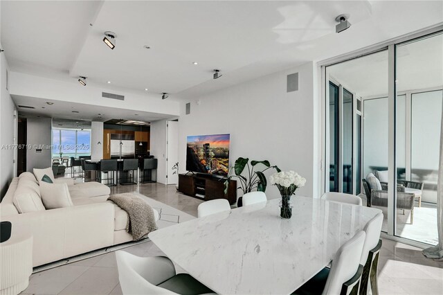 100 S Pointe Dr Unit 3102, Miami Beach, FL 33139 - dining room featuring light tile patterned flooring and recessed lighting