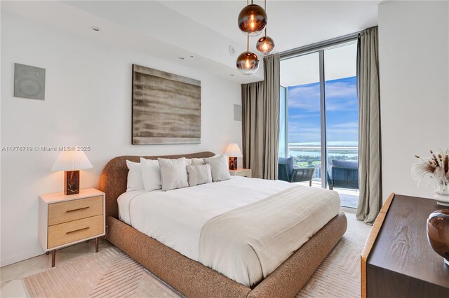 100 S Pointe Dr Unit 3102, Miami Beach, FL 33139 - bedroom with a wall of windows and access to exterior