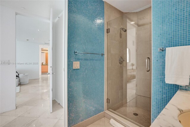 100 S Pointe Dr Unit 3102, Miami Beach, FL 33139 - full bathroom featuring a shower stall and tile walls