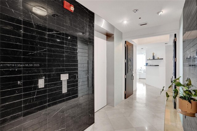 100 S Pointe Dr Unit 3102, Miami Beach, FL 33139 - hall with light tile patterned floors