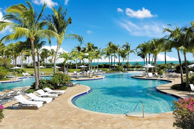 100 S Pointe Dr Unit 3102, Miami Beach, FL 33139 - community pool featuring a patio area