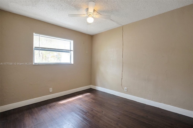 4061 N Dixie Hwy Unit 29, Oakland Park, FL 33334 - spare room featuring a ceiling fan, dark wood-style floors, baseboards, and a textured ceiling