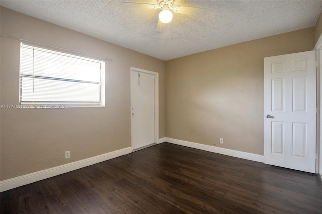 4061 N Dixie Hwy Unit 29, Oakland Park, FL 33334 - spare room featuring a textured ceiling, ceiling fan, baseboards, and dark wood-type flooring