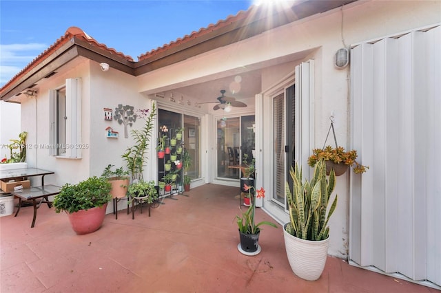 view of patio / terrace featuring a ceiling fan
