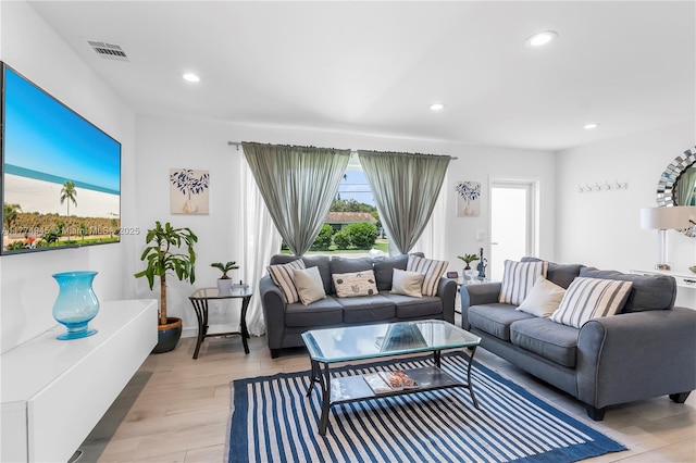 11215 NE 4th Ave, Miami, FL 33161 - living area with light wood-style floors and recessed lighting