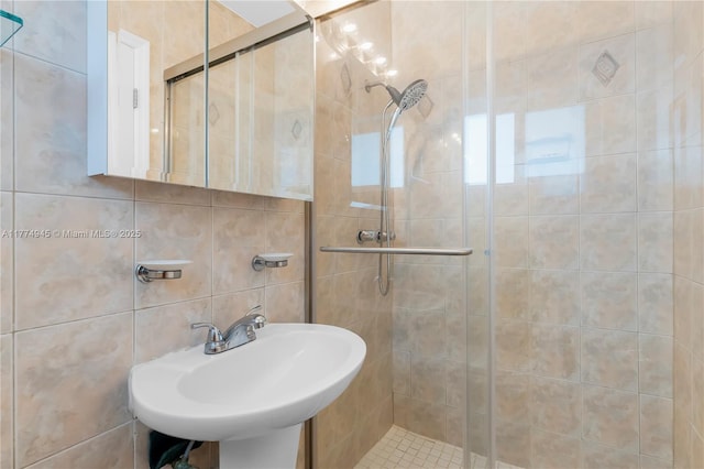 11215 NE 4th Ave, Miami, FL 33161 - bathroom with a shower stall and tile walls