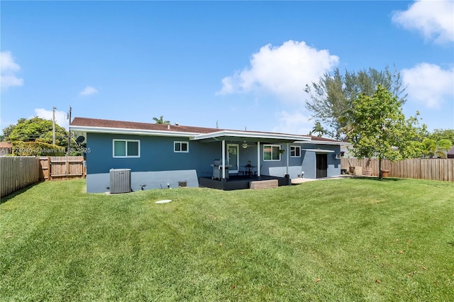 11215 NE 4th Ave, Miami, FL 33161 - back of property with stucco siding, a patio area, and a fenced backyard