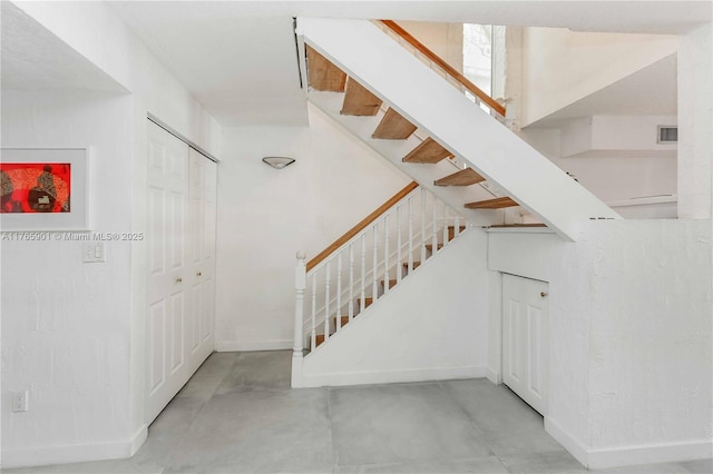 4901 SW 71st Pl Unit 4901, Miami, FL 33155 - staircase with concrete floors, visible vents, and baseboards