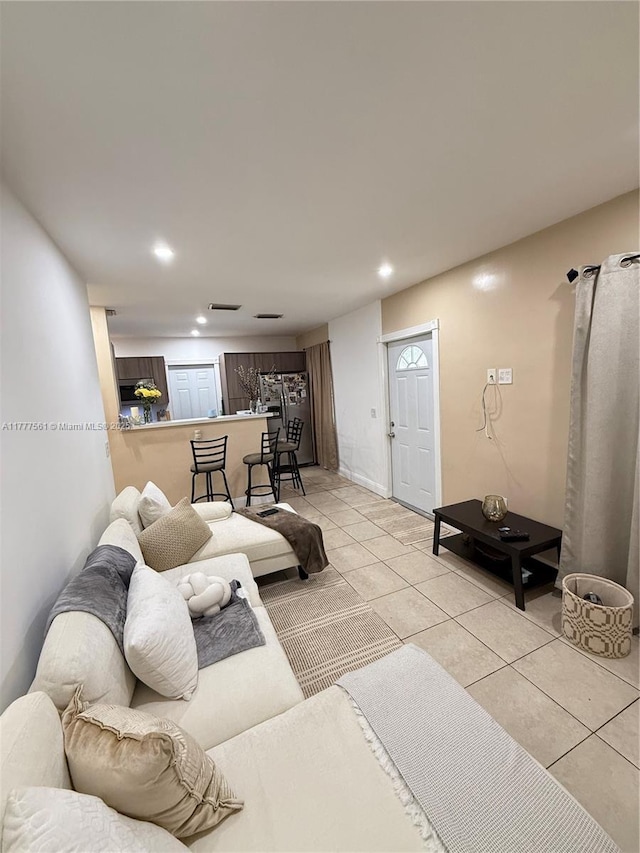 4441 SW 33rd Dr, West Park, FL 33023 - living area with light tile patterned floors and recessed lighting