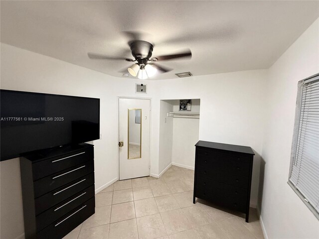 4441 SW 33rd Dr, West Park, FL 33023 - unfurnished bedroom with light tile patterned floors and a ceiling fan