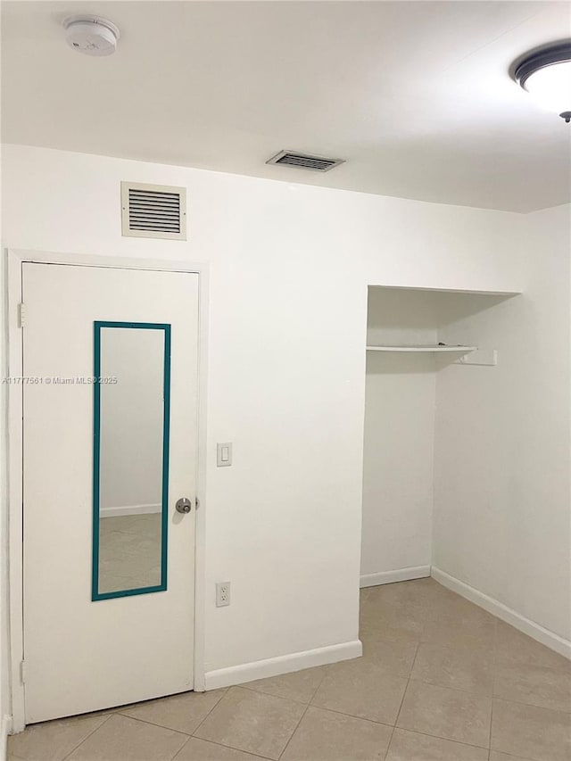 4441 SW 33rd Dr, West Park, FL 33023 - unfurnished bedroom with light tile patterned floors and a closet