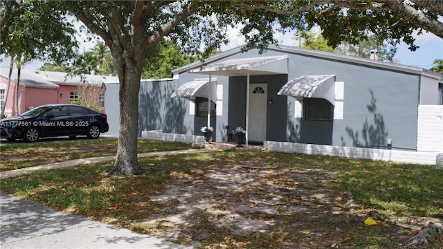 4441 SW 33rd Dr, West Park, FL 33023 - view of front facade featuring brick siding