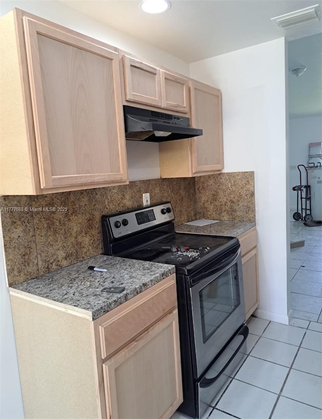 28315 SW 141st Pl Unit 28315, Homestead, FL 33033 - kitchen featuring stainless steel range with electric cooktop, under cabinet range hood, light brown cabinets, light tile patterned floors, and backsplash