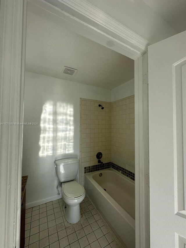 28315 SW 141st Pl Unit 28315, Homestead, FL 33033 - full bathroom with tile patterned floors, toilet, shower / bath combination, baseboards, and vanity