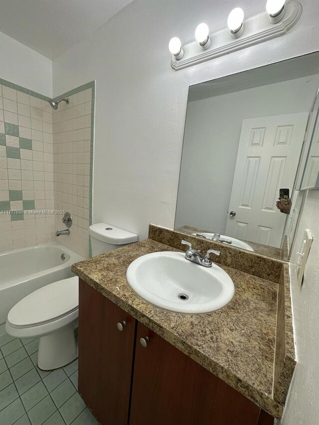 28315 SW 141st Pl Unit 28315, Homestead, FL 33033 - bathroom with toilet, vanity, tile patterned flooring, and bathing tub / shower combination