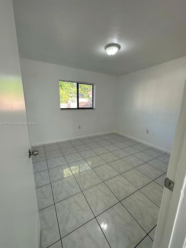28315 SW 141st Pl Unit 28315, Homestead, FL 33033 - spare room featuring baseboards